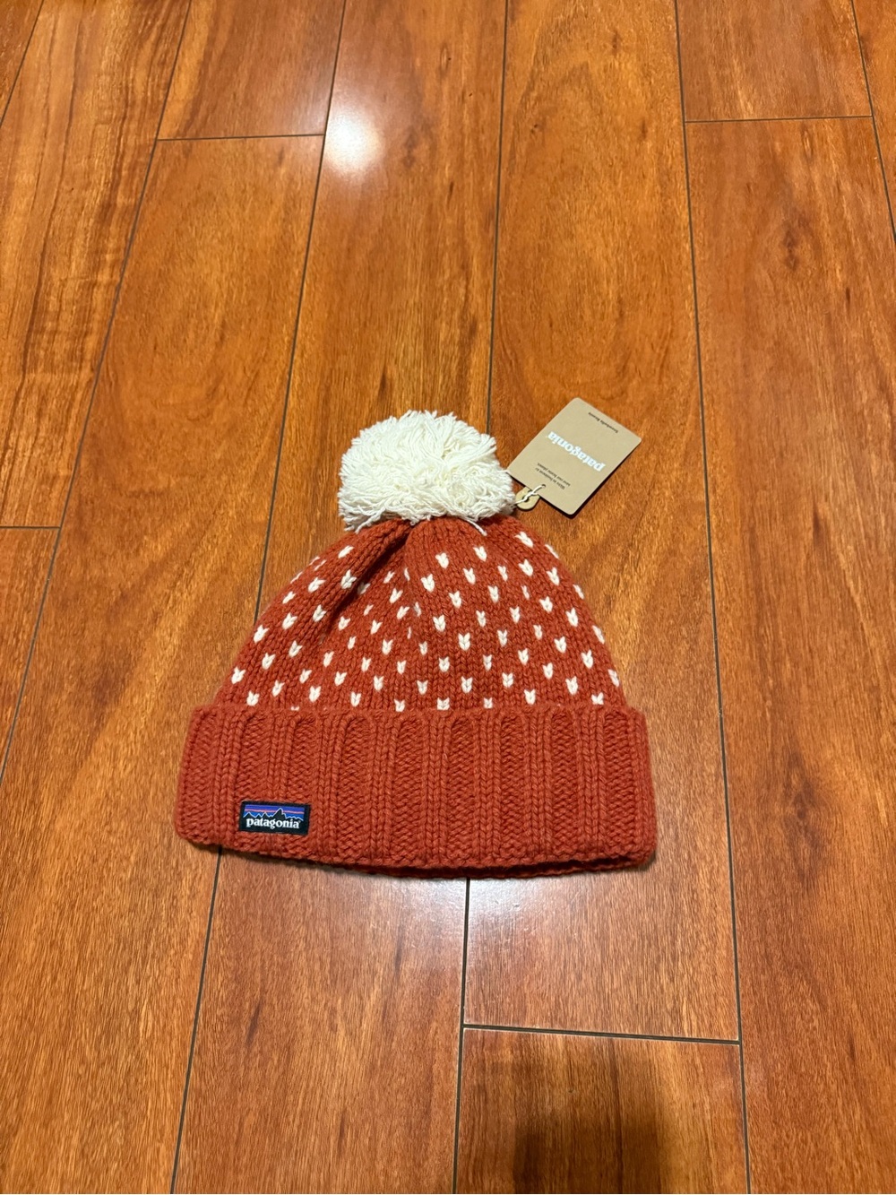 Patagonia women’s Pom Pom Beanie - Rust with Cream Accents
